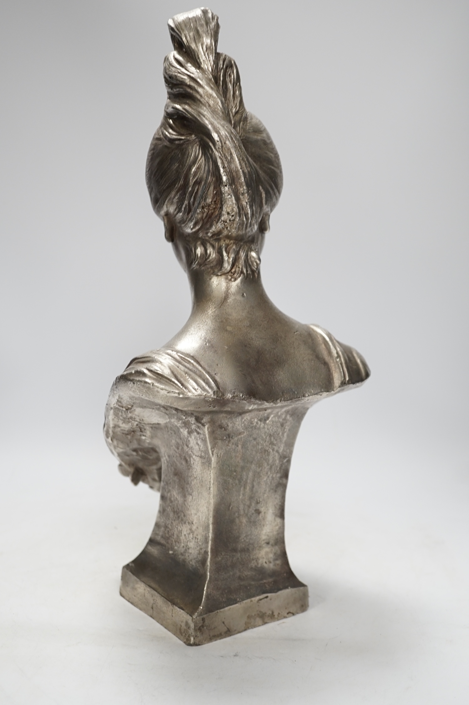 After Leiche, a polished spelter bust of ‘Rieuse’, 45cm